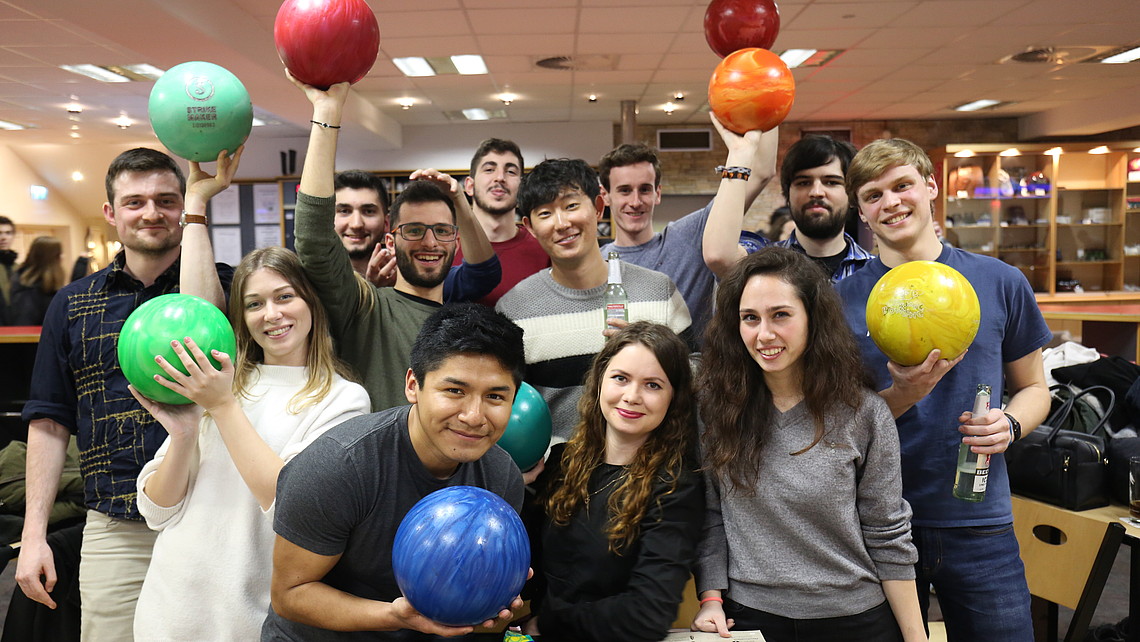 Group of students with bowling balls